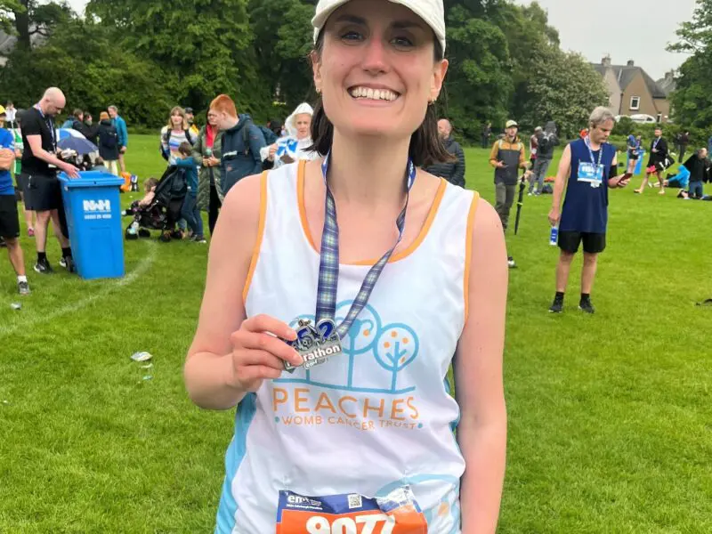 Photograph of Dr Heather Agnew with medal