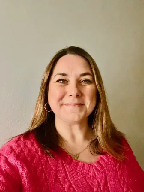 Picture of Operations Executive - Julia Hewer, white female wearing pink jumper